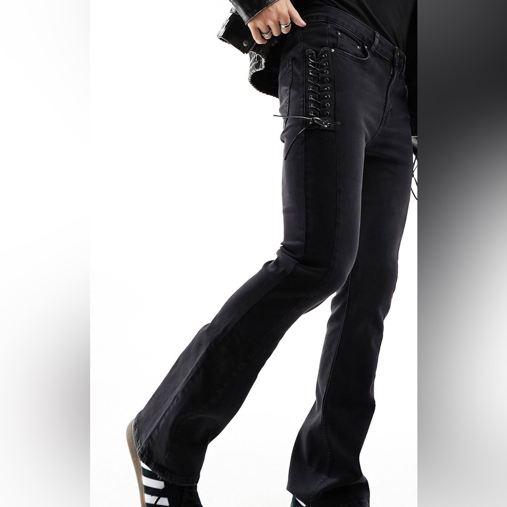ASOS DESIGN stretch flare jeans with lace up tie detailing in washed black
